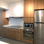 kitchen cabinet with fridge