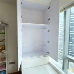 Custom open bedroom wardrobe with hanging rods and shelving built by direct carpenter Singapore